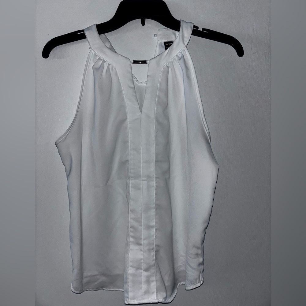 Elegant White Halter Top
Xs